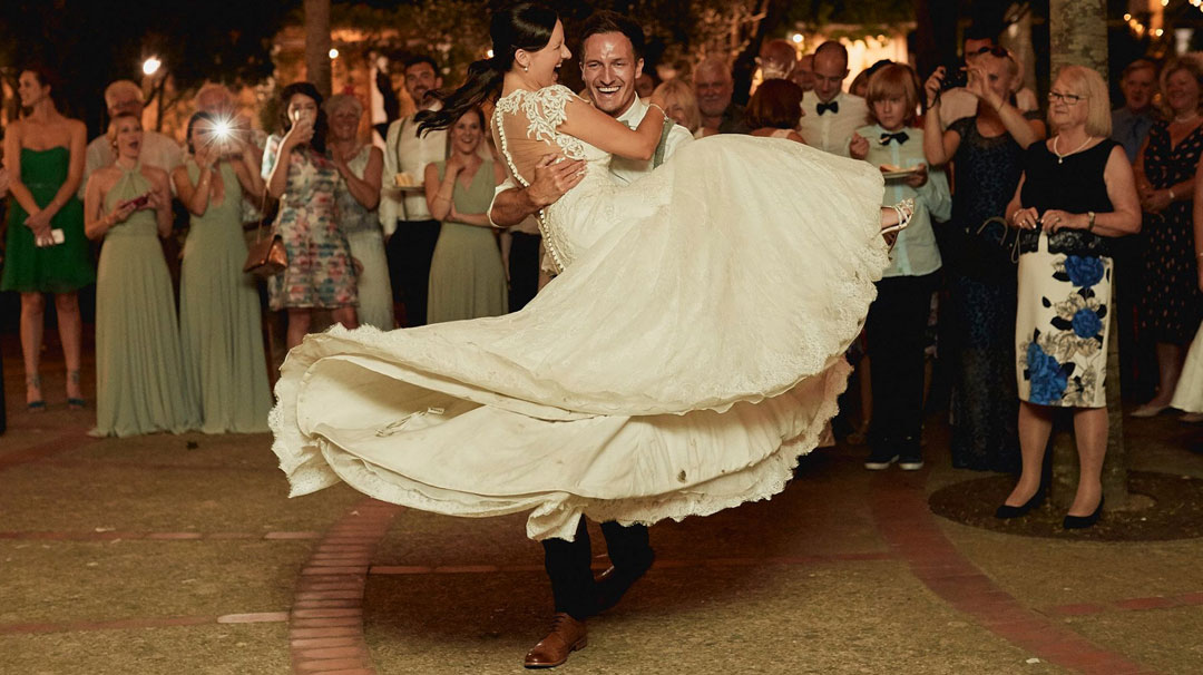 couple celebrating their wedding and having their first dance